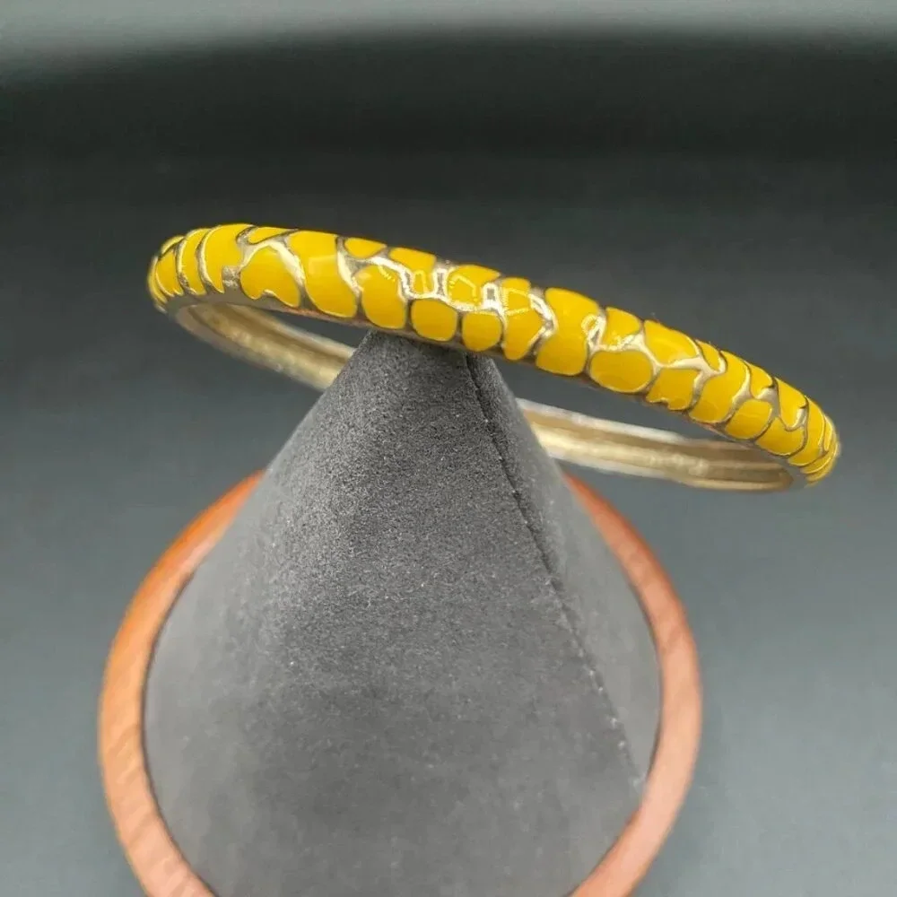 Gold enamel stacking bangle bracelet set in gold tone